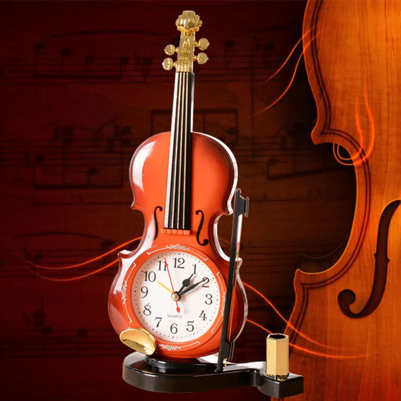 Brown plastic violin pen inserted alarm clock with quartz movement and LED display on a desk