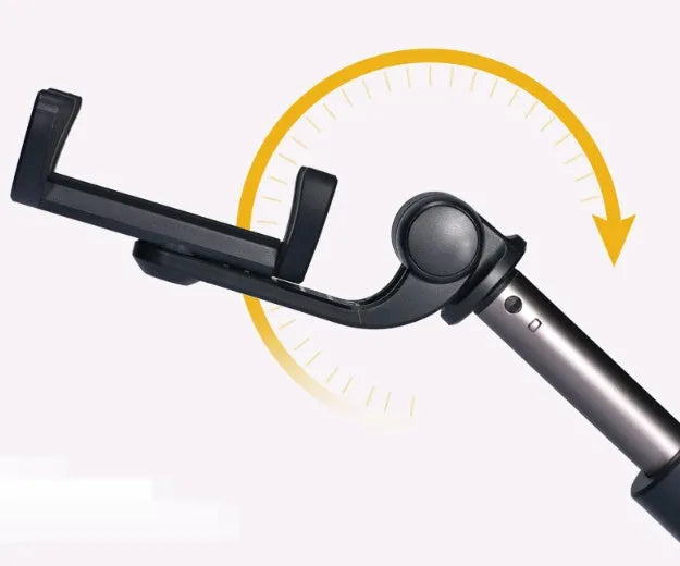 Aluminium Bluetooth selfie stick with tripod base and remote control next to a smartphone