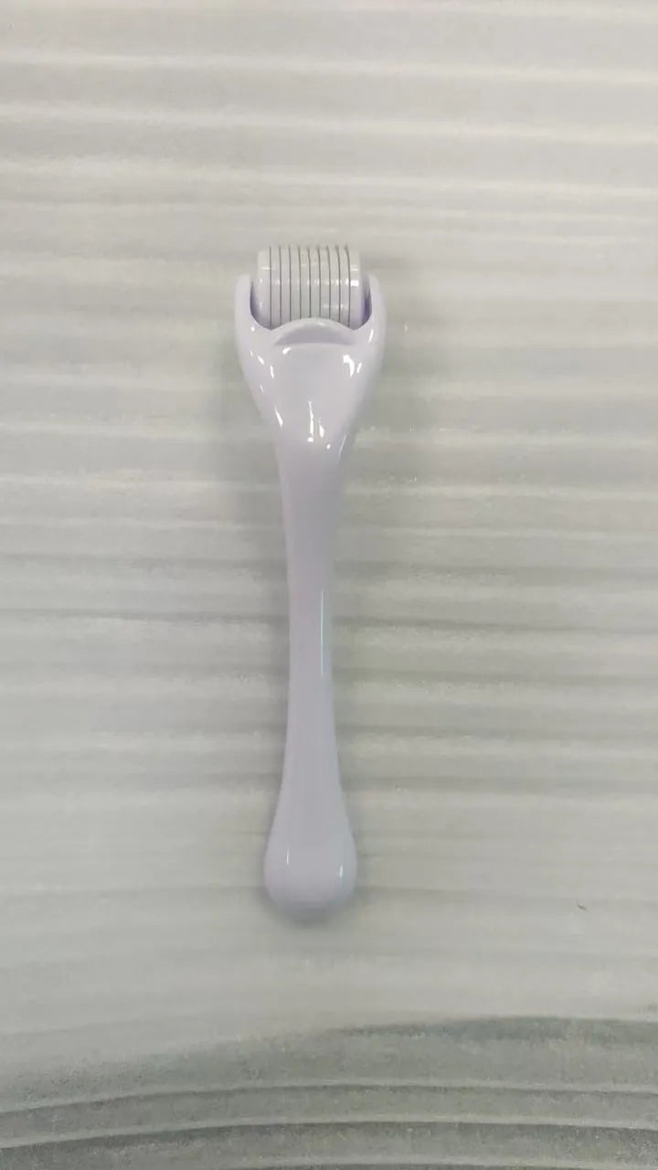 540 micro needle derma roller with black handle and purple wheel, showing adjustable needle sizes.