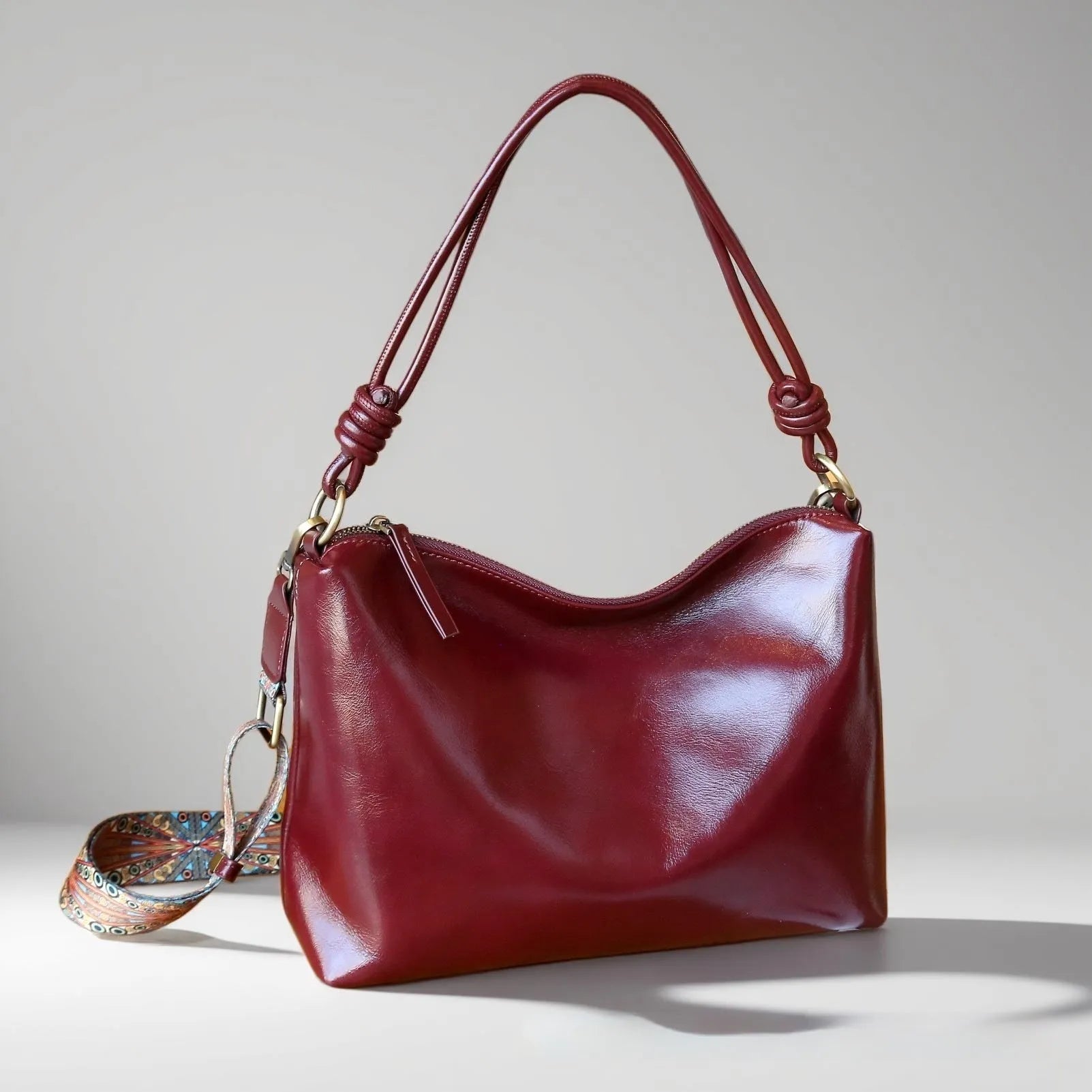 Genuine leather hand shoulder bag in caramel colour, pillow shape, top grain leather, 31x11x24cm