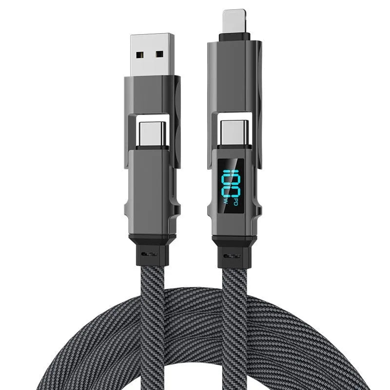 Black four-in-one charging cable with digital display and zinc alloy connectors on a surface
