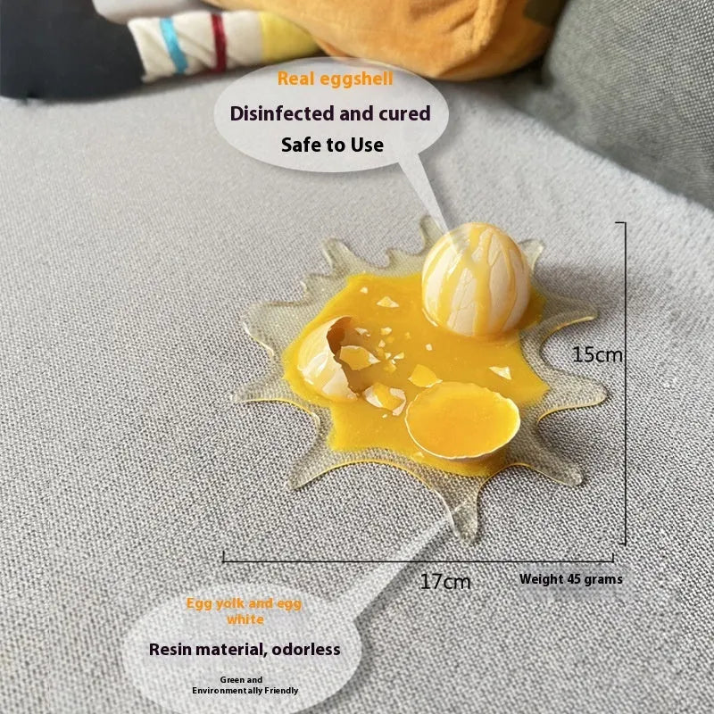 Broken egg shaped decompression toy mobile phone holder measuring 15x17cm in broken egg colour