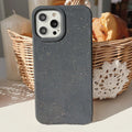 Fully degradable phone case for iPhone 14 Pro Max in white made from wheat straw fibre material
