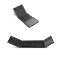 Black tri-fold Bluetooth keyboard shown folded and unfolded beside smartphone