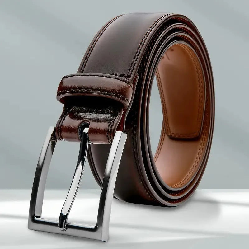 Men's brown genuine leather casual belt with a silver alloy buckle on a plain background.