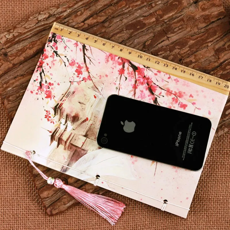 Watercolour retro Chinese style line-bound notebook with exposed ancient thread binding in Azalea colour