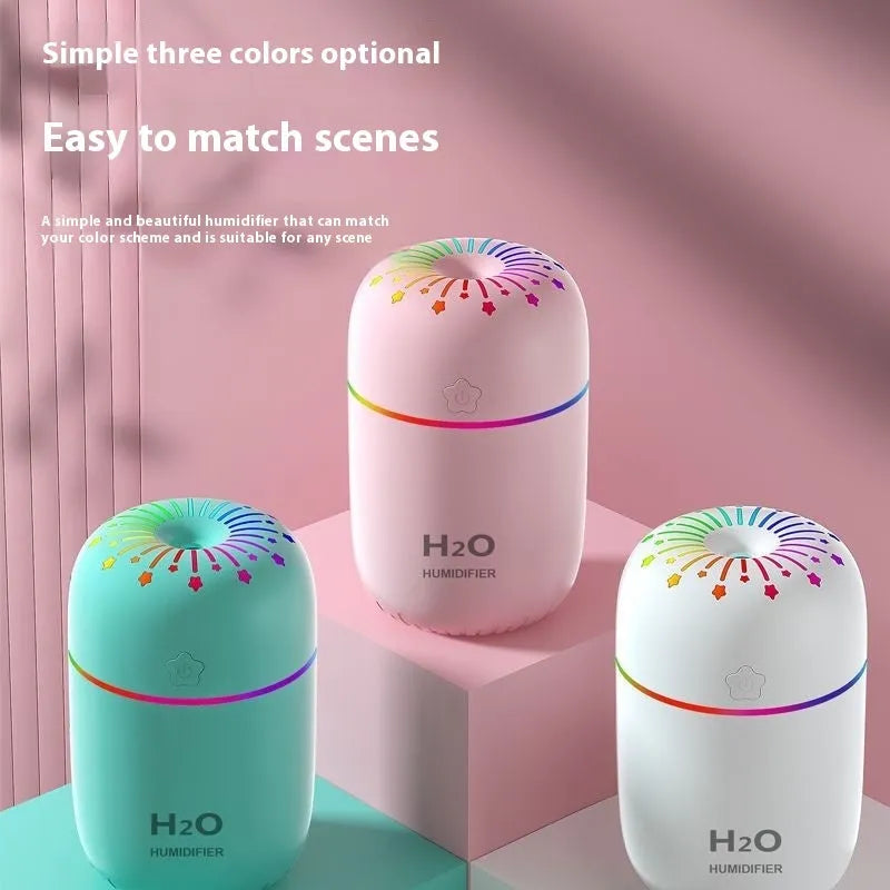USB mini humidifier with fireworks design in green colour, showing compact 75x75x116mm dimensions