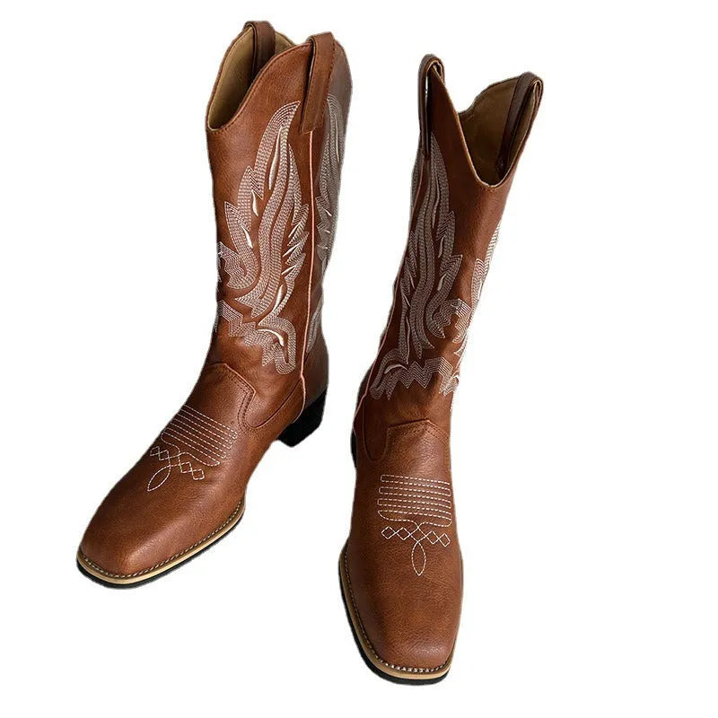 Brown women's mid-calf Martin boots with embroidery detailing and waterproof platform