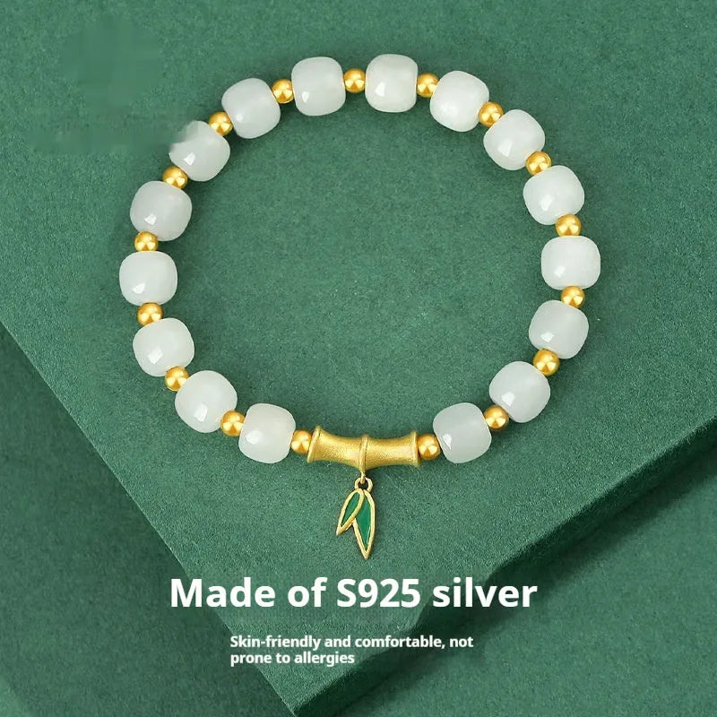 Women's S925 sterling silver and Hetian jade bracelet with bamboo leaf design.