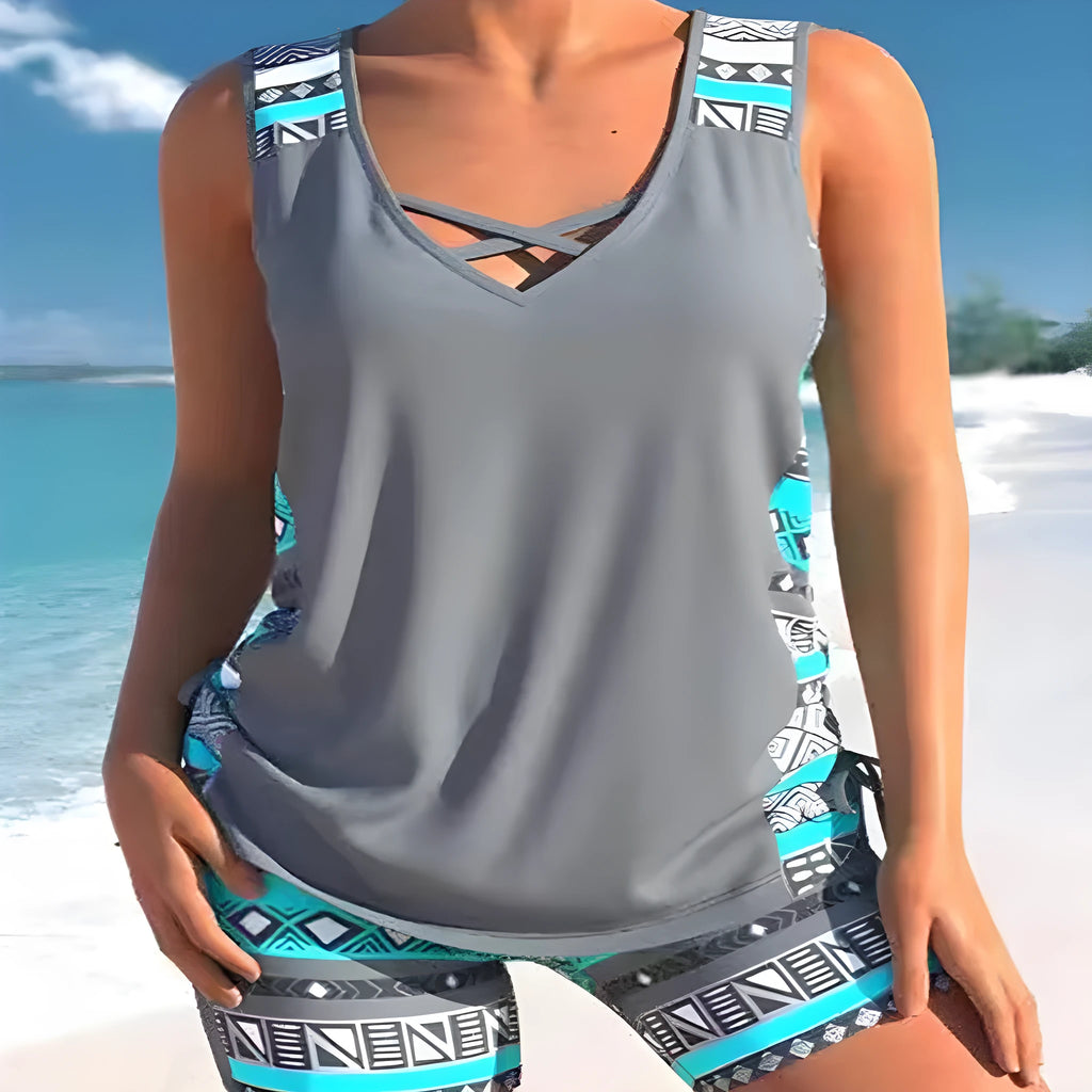 Women's blue lace print two-piece swimsuit set showing top and shorts separately
