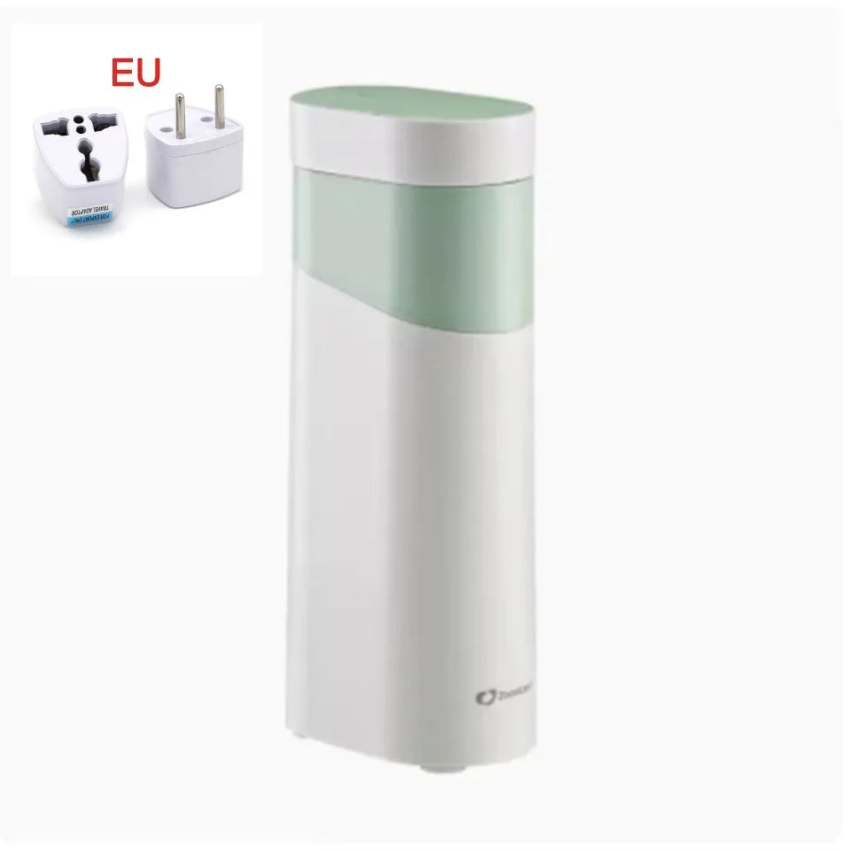Black portable instant water dispenser with digital display on a wooden desktop.
