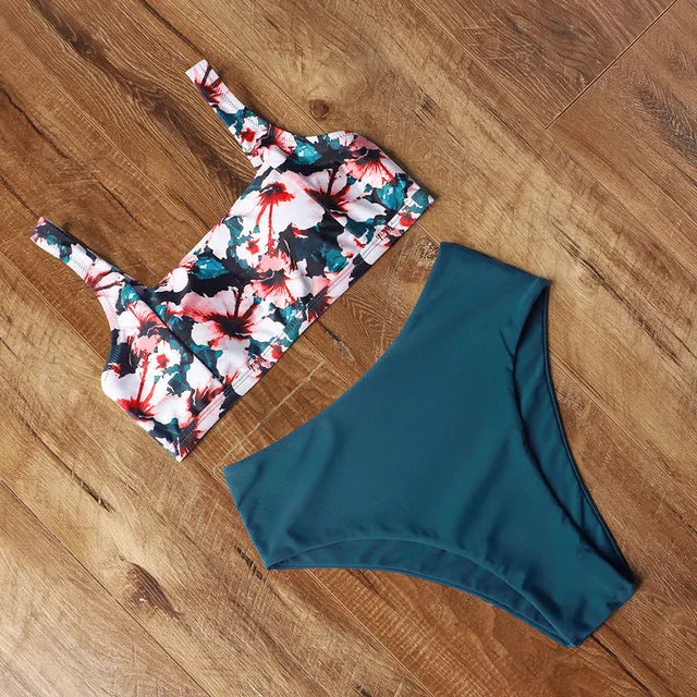 Women's high waist leopard print bikini set with push-up top and matching briefs on a mannequin.