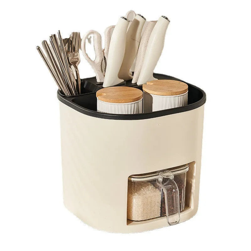 Rotating kitchen storage organiser with spice box compartments on countertop