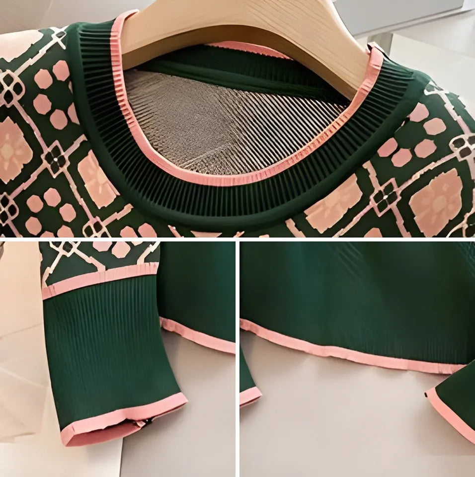 Green printed knit sweater on hanger showing loose fit and graphic pattern detail