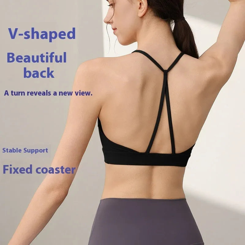 Women's nylon sports vest with fixed double-shoulder straps on a hanger