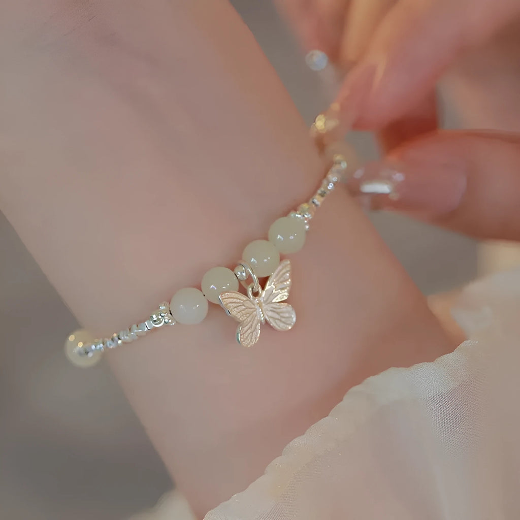 Silver butterfly necklace and bracelet set for women with electroplated copper construction