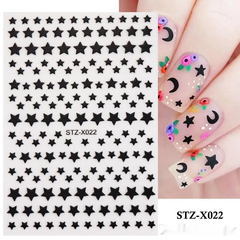 Black and silver stripe nail art sticker with a love pattern design on a plastic sheet.