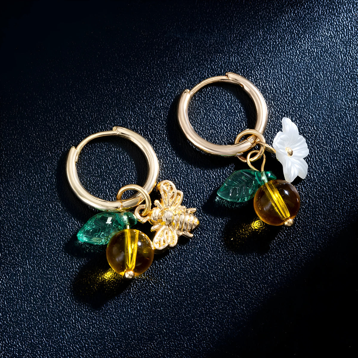 Sweet alloy and glass bee pendant ear cuff with flower and leaf motifs for women