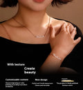 Stainless steel digital bracelet with diamond-studded numbers in gold finish on wrist.