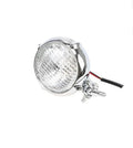 Black electroplated aluminium Harley halogen headlamp with 8cm diameter and yellow glass.