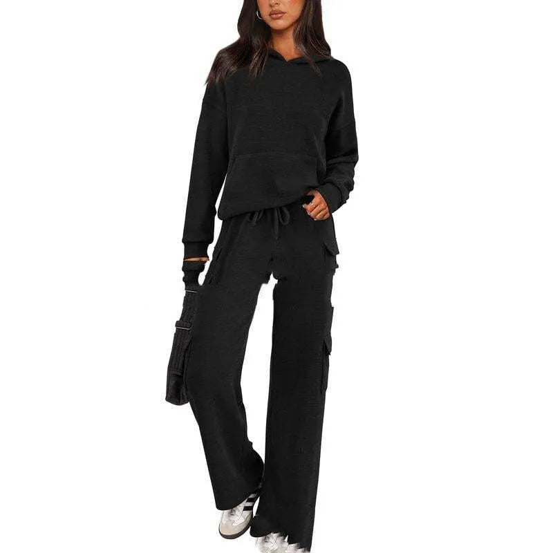 Women's breathable polyester leisure sports suit with long sleeves and matching trousers, available in multiple colours