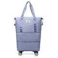Blue large-capacity travel bag with omnidirectional wheels and Oxford cloth exterior