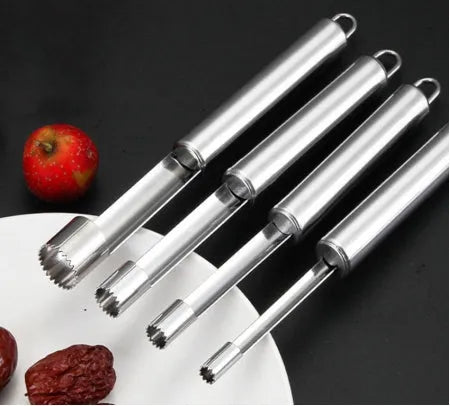 Stainless steel pineapple corer slicer with ABS handle on a kitchen worktop