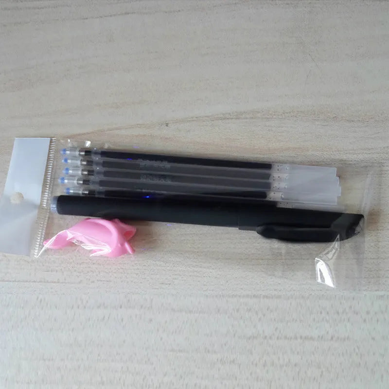 Automatic fade and disappear pen set showing pen holder and refills for temporary marking
