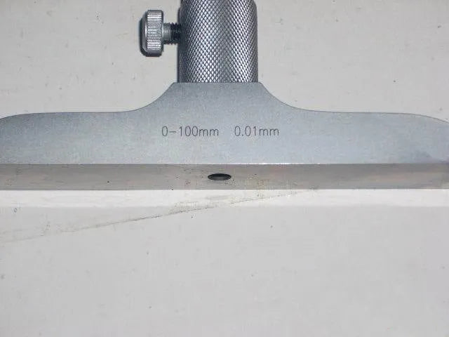 Alloy depth micrometer tool with a 0-100mm measuring range for precision engineering.