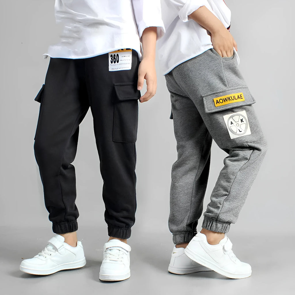 Boys' cotton track pants in black, available in sizes 120cm to 160cm for ages 5-14