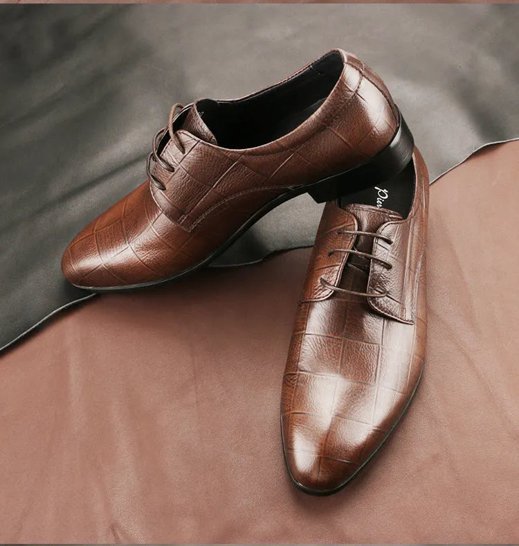 Men's black leather derby shoes with a checkered pattern on the pointed toe.