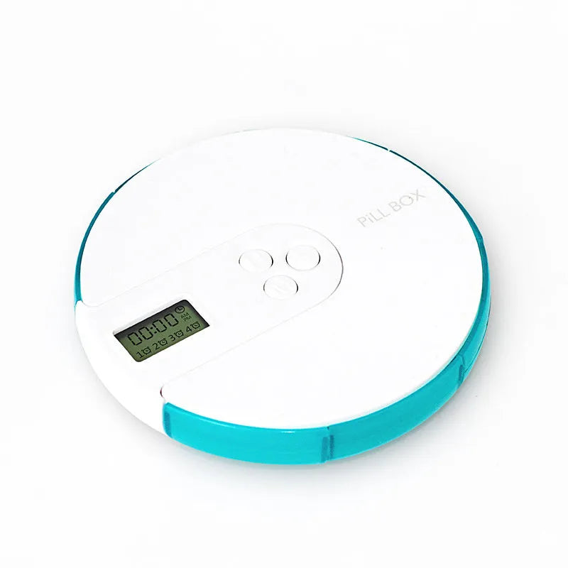 Seven-compartment alarm clock pill dispenser in blue, showing timer display and storage lids.