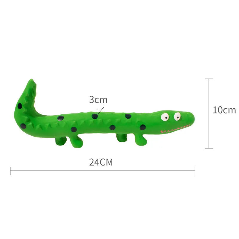 Green lizard-shaped dog chew toy with textured surface and squeaker for teeth cleaning