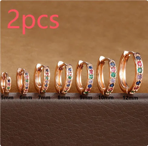 Circle geometric zircon stud earrings in gold, rose gold, and silver colours showing 5mm to 12mm size range
