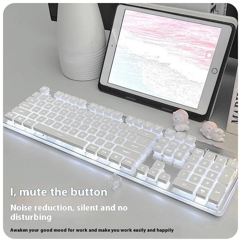 Wired mute keyboard with mechanical feel, ABS construction, 44x13x2cm, white light variant on desk