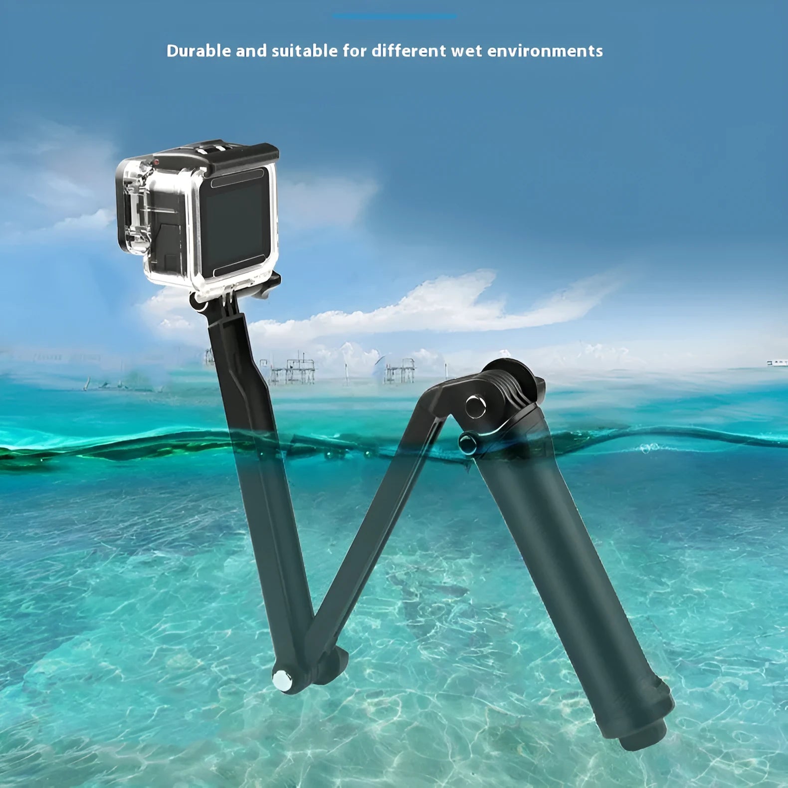 Black portable folding tripod bracket for GoPro Hero action cameras on a flat surface.
