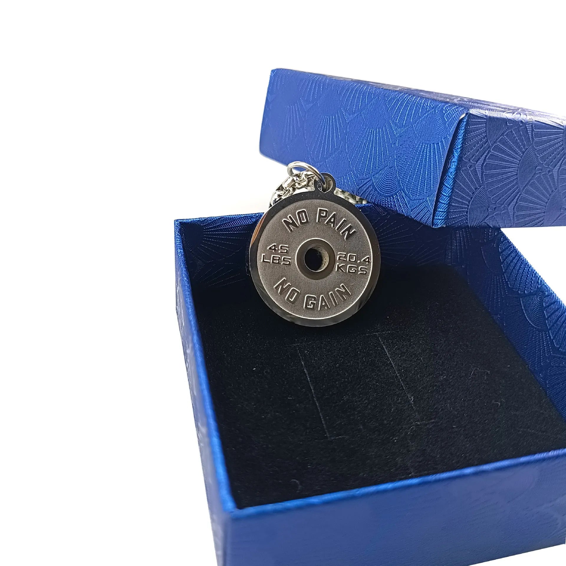 Polished stainless steel barbell disk pendant necklace on a choice of pearl, gold, or black 60cm chain.