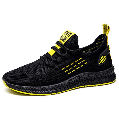 Men's black casual sports shoes with three white stripes and cross-strap detail on the Flying Weave upper.