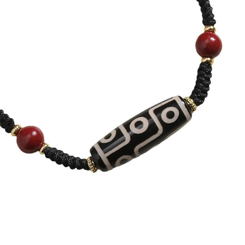 Adjustable Tibetan agate dzi bead bracelet showing traditional bead patterns