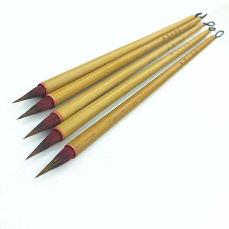 Small red Chinese writing brush with wooden penholder for calligraphy