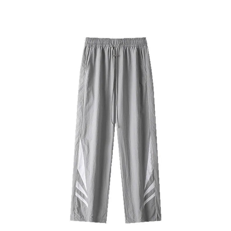 Men's black straight-leg summer trousers with an elastic waistband on a plus-size model