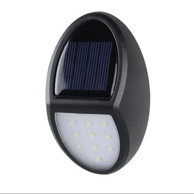 Black rectangular LED solar wall light with integrated solar panel on top