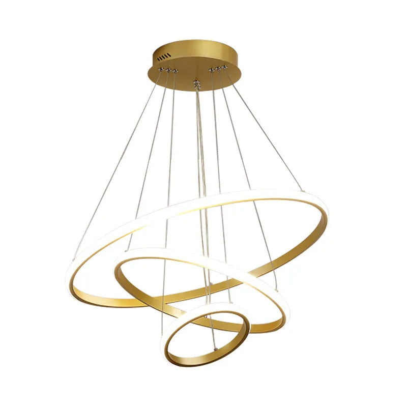 Gold smart LED chandelier with aluminium alloy build and tiered shades over a dining table