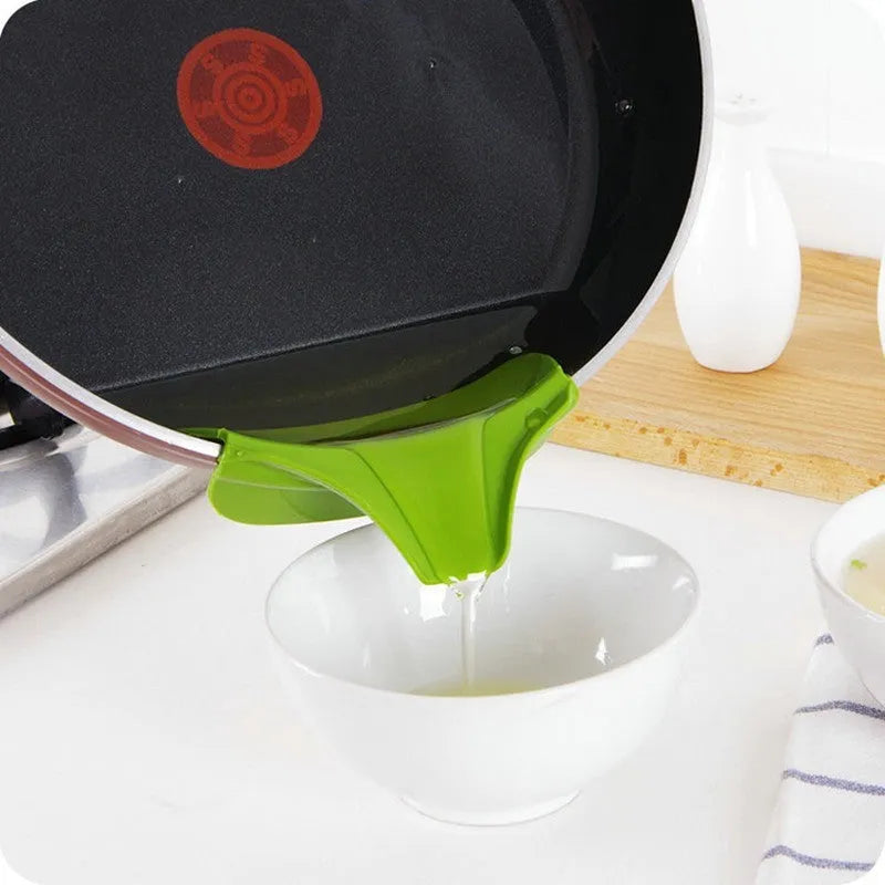 Green silicone kitchen funnel with clamp for securing to round pot edges