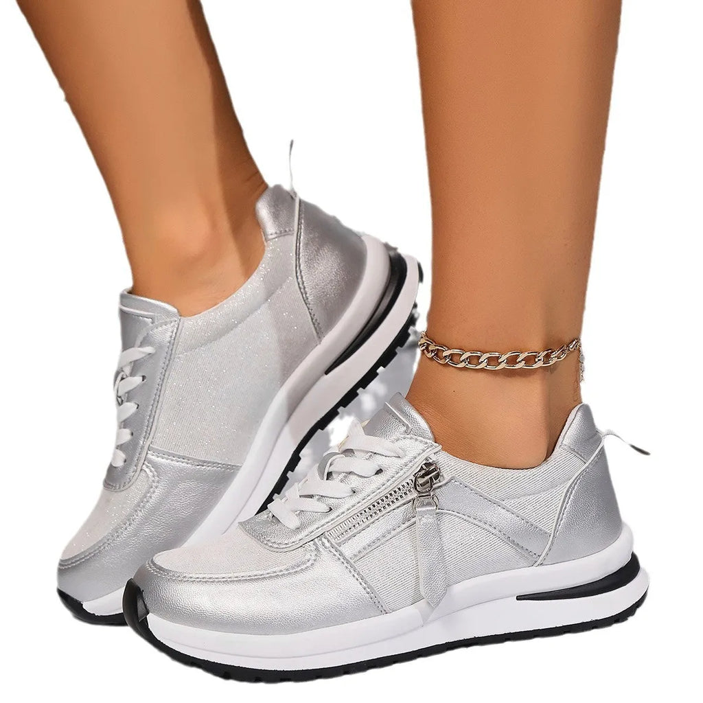 Women's flat lace-up pumps in solid colours with round toe and rubber sole