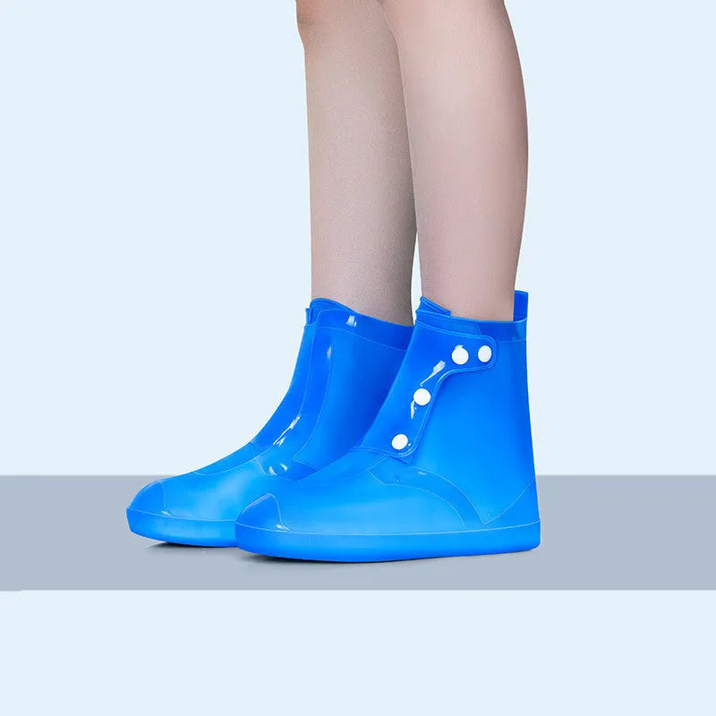 White PVC women's reusable waterproof shoe covers with high top design