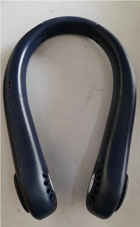 A white rechargeable bladeless neck fan hanging around a person's neck, showing its compact, hands-free design.