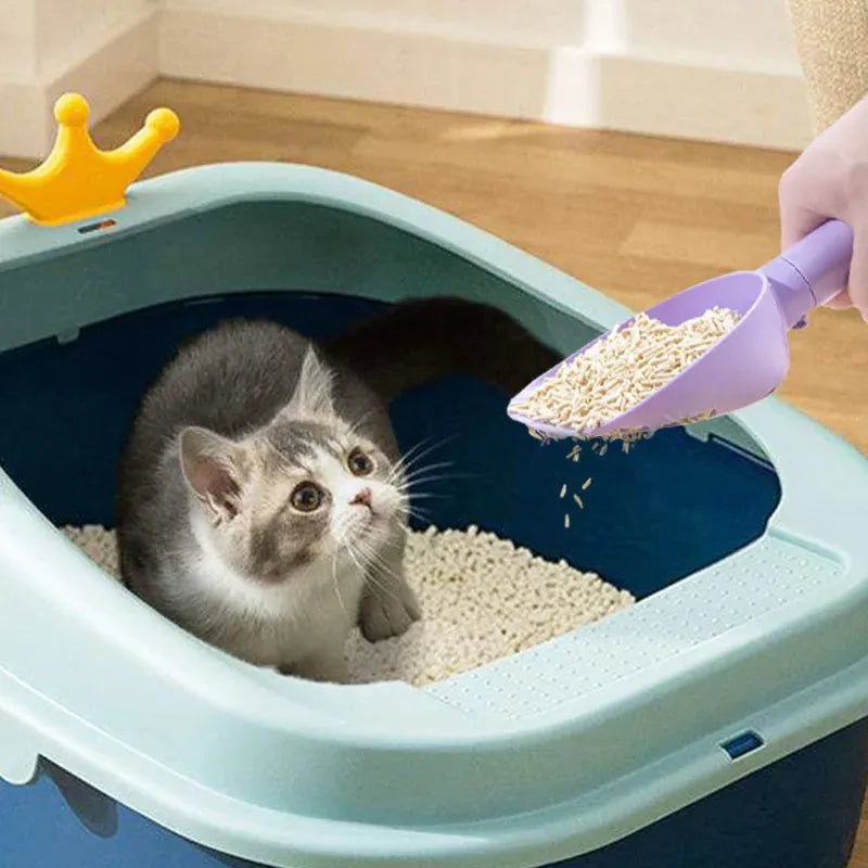 White ABS plastic cat litter scoop with storage base and hidden waste bag compartment