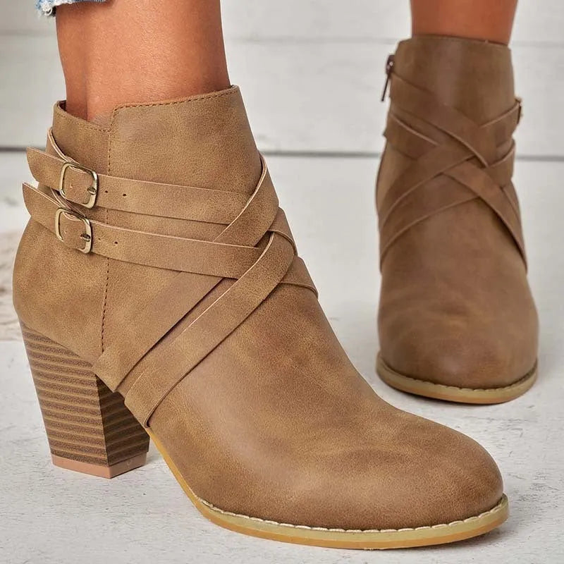 Plus size short ankle boots with a 7cm heel and side zip, shown in grey, black and brown.