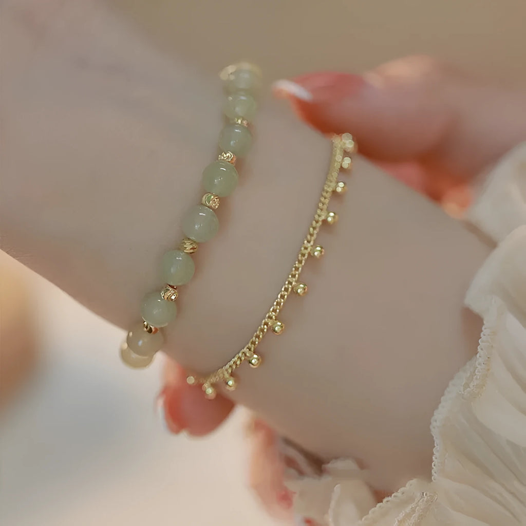 Hetian Jade bracelet with princess running beaded style on neutral background